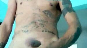 Skinny guy shows his banana toy at home