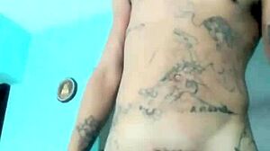 Skinny guy shows his banana toy at home