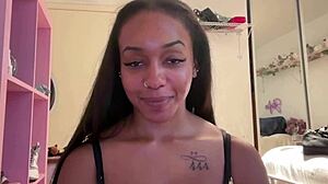 lily starfire explores deeper in backstage setting with oiled body and ebony appearance