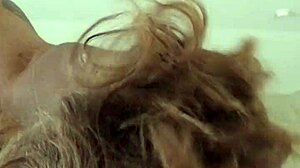 little girl watches herself getting hit by daddy's big black stick