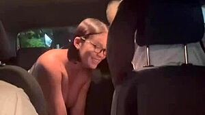 Asian woman sits on Uber driver as fiancé drives