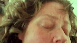 little girl watches herself getting hit by daddy's big black stick