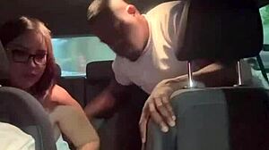 Asian woman sits on Uber driver as fiancé drives