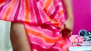 Indian aunty boldly shows boob while dancing hotly.