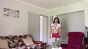 Beautiful asian ladyboy performs striptease and masturbates sensually