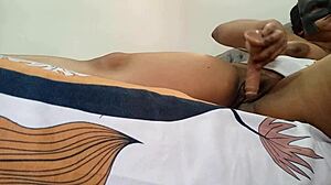 My delicious prostitute fingers her juicy pussy on the bed edge