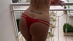 Lisa flashing lingerie on balcony with tattoo 😘