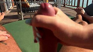 hot bbw milf babe gives fast sloppy handjob to monster cock on balcony over ocean