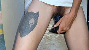 watching her dildo fuck hairy pussy while masturbating shaved one