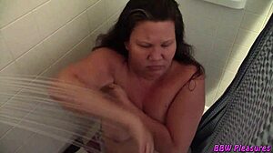 Naughty BBW housewife strips naked in the shower for her husband