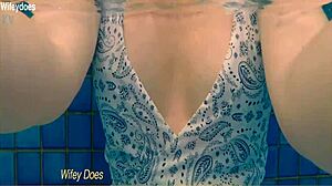 Wife Enjoys Swimming in Hotel Pool One Piece