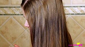 Skinny teen brunette enjoys a refreshing shower!