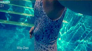 Wife Enjoys Swimming in Hotel Pool One Piece