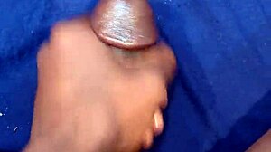 He shoots a massive cumshot after masturbating his big black cock