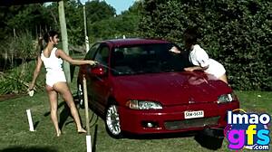 two hot brunettes naked in the carwash showing off big tits and perfect ass