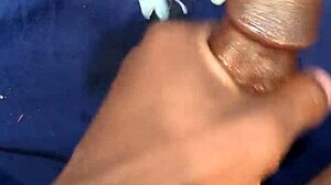 He shoots a massive cumshot after masturbating his big black cock