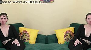 Two-piece black outfit with deep plunging neck on Kit Summers