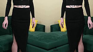 Two-piece black outfit with deep plunging neck on Kit Summers
