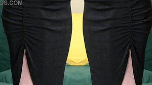 Two-piece black outfit with deep plunging neck on Kit Summers