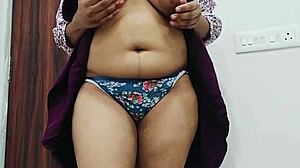 College girl fingers herself with a big eggplant in homemade creamy scene.