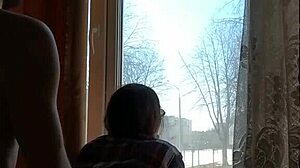 Helga Bosk Has Risky Sex by the Window with People Walking By