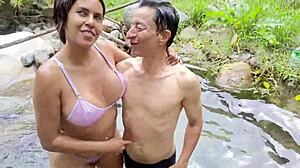 Busty stepmother seduces old pervert by river