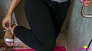 stunning bronze skin model enjoys a relaxing shower.