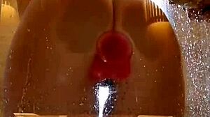 girl with appetizing ass in shower with dildo