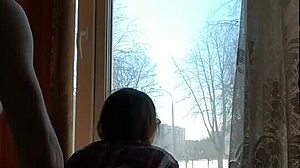 Helga Bosk Has Risky Sex by the Window with People Walking By