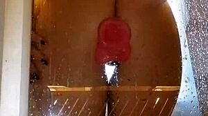girl with appetizing ass in shower with dildo