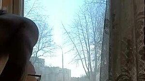 Helga Bosk Has Risky Sex by the Window with People Walking By