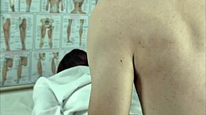 Redhead Nurse In Uniform Carefully Examines And Massages Patient's Hard Penis In The Medical Office