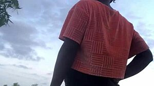 Half-naked crazy bitch twerking in the forest nature.