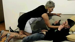 My stepmom discovers me masturbating and gives me a deep anal pounding by the window for neighbors to watch.