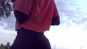 Half-naked crazy bitch twerking in the forest nature.