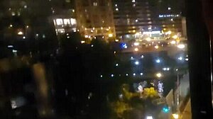 girlfriend masturbates discreetly by hotel window