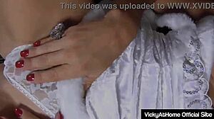 sensual princess vicky vette fingers her pussy while squeezing her big tits.