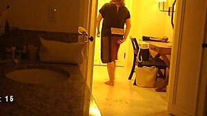 Hidden cam spying on mature milf in voyeur scene