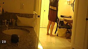 Hidden cam spying on mature milf in voyeur scene