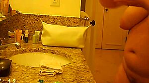 Hidden cam spying on mature milf in voyeur scene