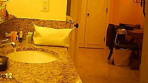 Hidden cam spying on mature milf in voyeur scene