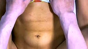 Stepfather and best friend share mischievous laugh in kitchen