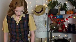 Glamorous redhead achieves intense orgasm using black vibrator