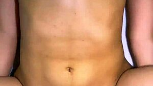 Stepfather and best friend share mischievous laugh in kitchen