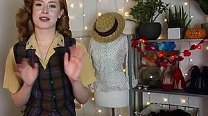 Glamorous redhead achieves intense orgasm using black vibrator