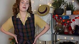 Glamorous redhead achieves intense orgasm using black vibrator