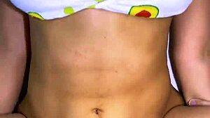 Stepfather and best friend share mischievous laugh in kitchen