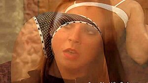 Two tied up lesbian slaves whipped by merciless mistress in bdsm session.