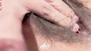 desi bhabhi at home, masturbating and fingering her hairy pussy like it's no big deal