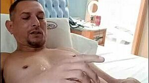 Intense bareback handjob leads to explosive cumshot on mature Brazilian guy.